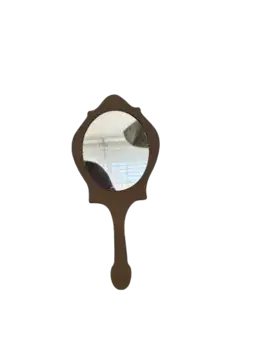 מראת יד מעוטרת
